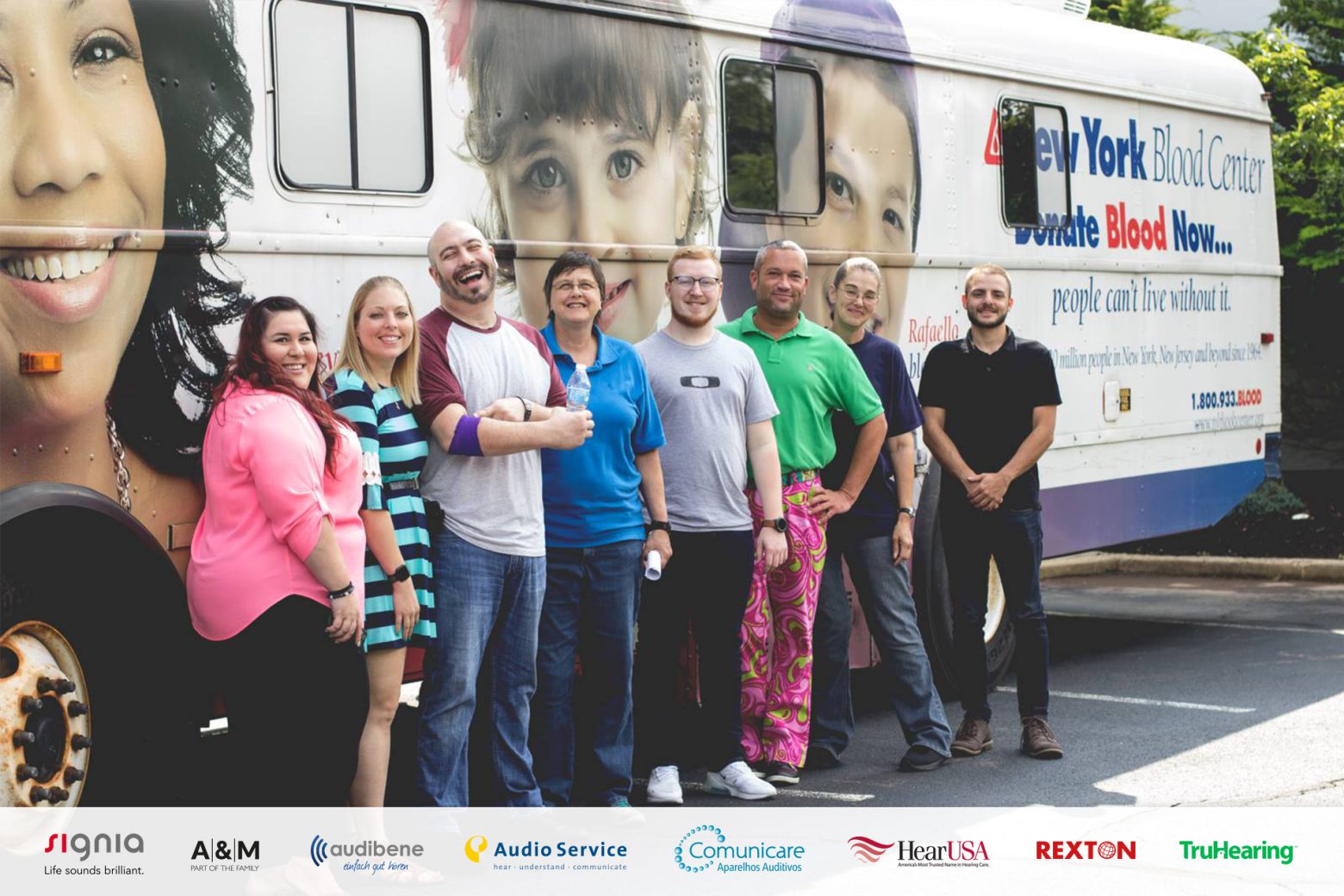 Sivantos employees in front of the truck from the New York Blood Center